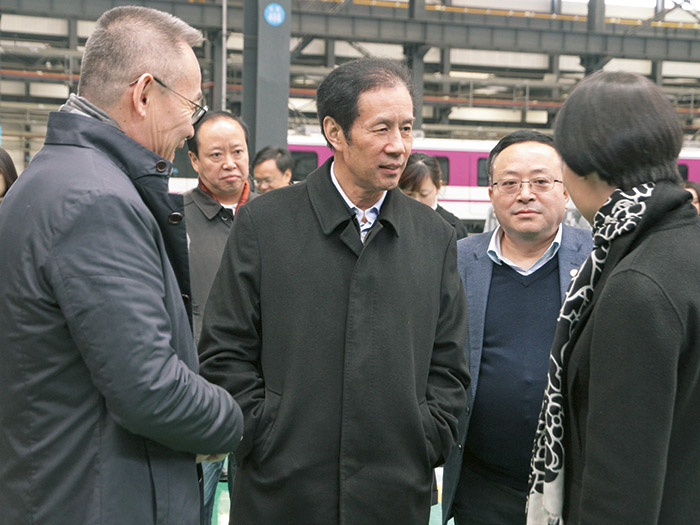  原四川省人大副主任陈光志一行莅临四川发展永兴集团yx06股份调研指导工作,公司董事长肖光辉陪同